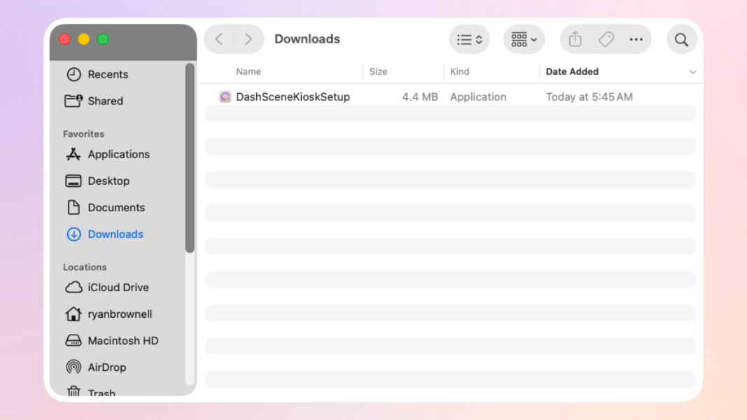 The macOS Downloads folder open in a Finder window, showing the DashSceneKioskSetup application icon.